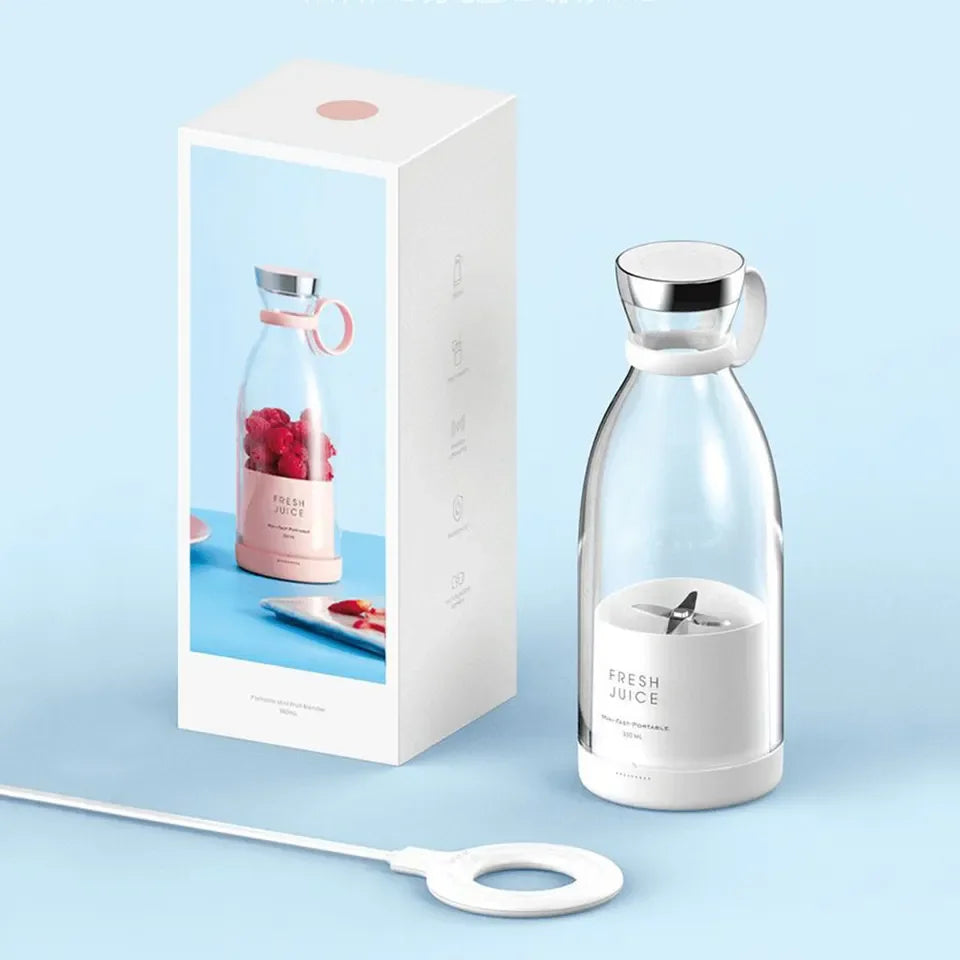 Portable electric juicer blender bottle with charging cable and packaging, white and pink, on light blue background