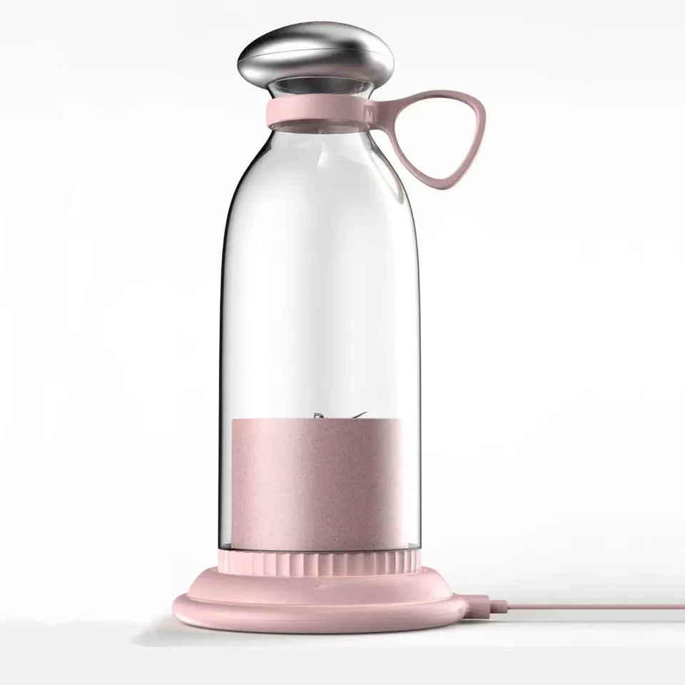 Modern pink and silver electric blender with handle for home kitchen use
