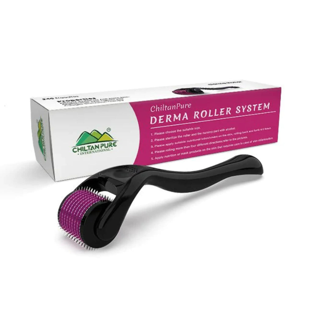 Derma roller system with black handle and purple microneedle roller beside product box